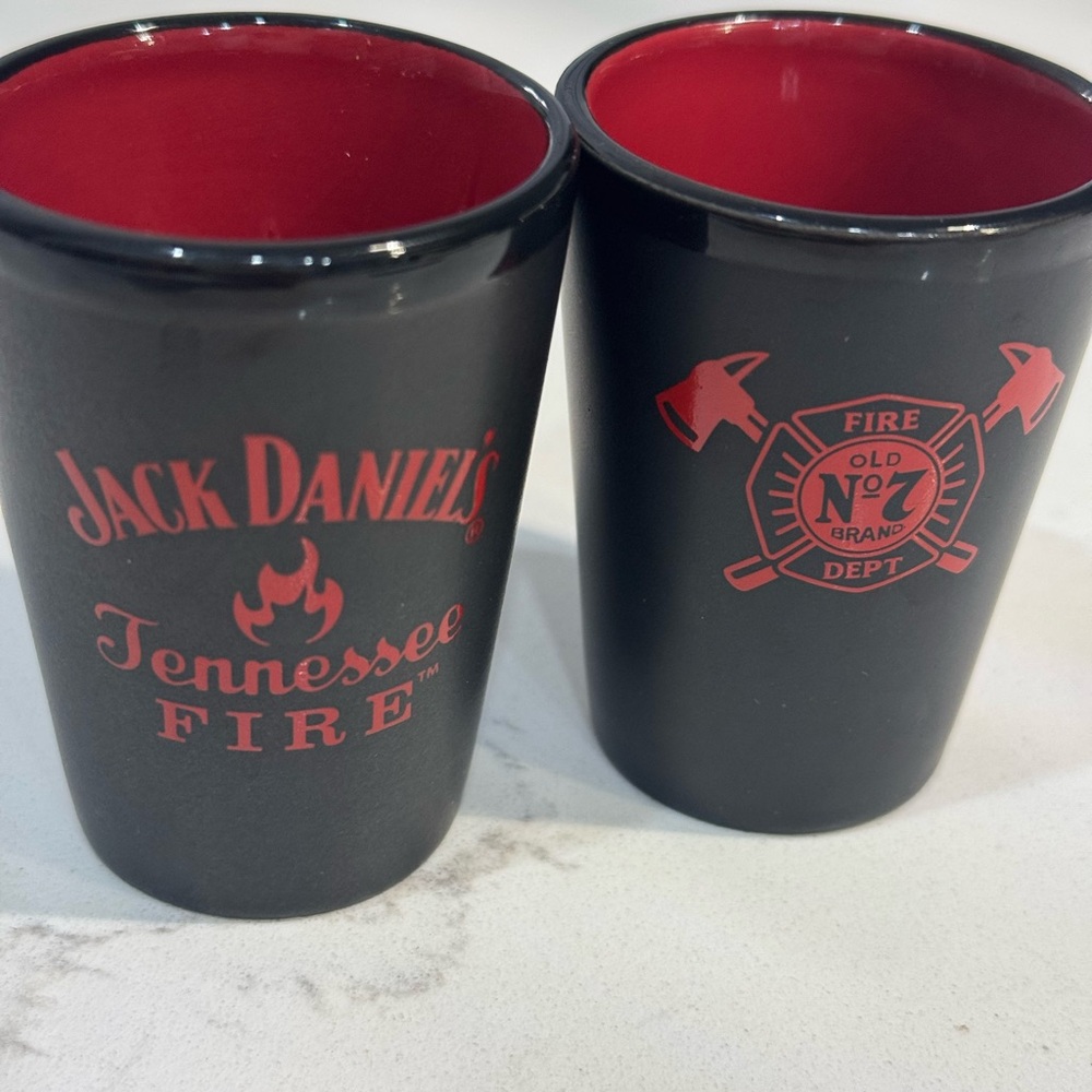 Jack Daniel’s Black and Red Shot Glasses.